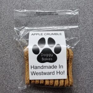 Doggy Bakes Of Westward Ho! Apple Crumble flavoured dog biscuits. 100g.